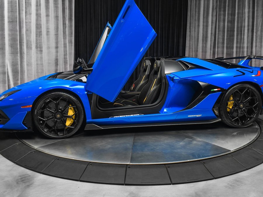 A Lamborghini Aventador SVJ Roadster staged in the Big G Toys Miami showroom